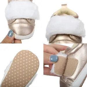 Detailed views of rose gold baby girl princess shoes with white faux fur and soft soles