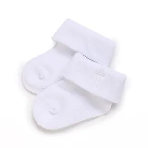 Soft white baby turnover socks with white embroidered cross detail for infants
