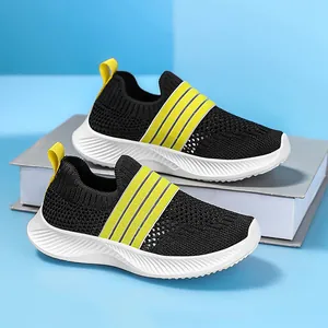 Lightweight breathable mesh kids sneakers in black with yellow stripes, slip-on casual shoes