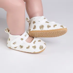 Comfortable white baby walking shoes with gold heart pattern for infants aged 0-1 year