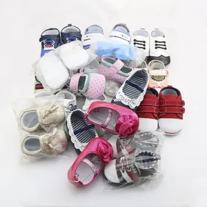 Collection of assorted soft sole infant walking shoes in various colors and styles