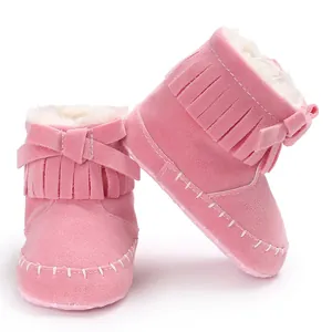 Cute pink tassel baby boots with soft soles and warm plush lining for toddlers and infants