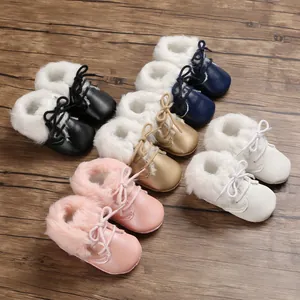 Variety of soft sole baby fur boots in pink, gold, black, navy, and white colors