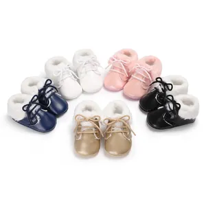 Collection of colorful baby winter boots featuring soft soles and white faux fur trim