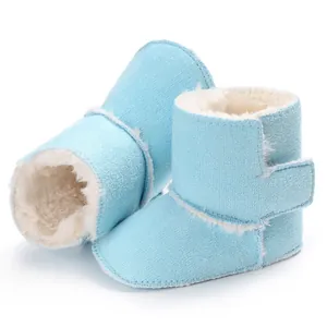 Botas de invierno cálidas azul claro para bebé con forro de piel sintética para 0-1 año.