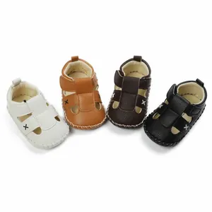 Infant faux leather walking sandals shown in four classic colors for boys and girls.