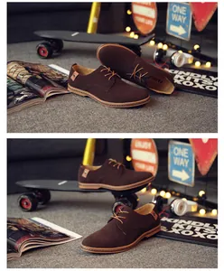 Brown suede casual Oxford shoes for men displayed in a stylish lifestyle setting with skateboard