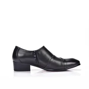 Side profile of elegant black leather men's dress shoes with side zipper detail