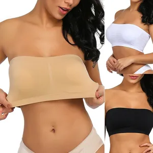 Detailed view of a seamless strapless tube bra in beige, white, and black colors.