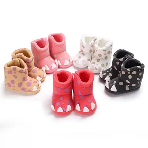 Various colorful warm winter baby boots with cute claw design and soft soles