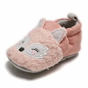 Close-up of pink baby fox shoe showing soft fleece texture and cute embroidery