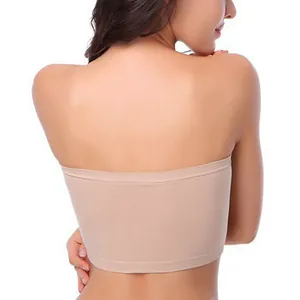 Detailed back view of a seamless beige bandeau bra showing a comfortable fit on model