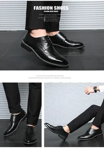 Détail de chaussures Richelieu noires en cuir pour hommes avec perforations classiques