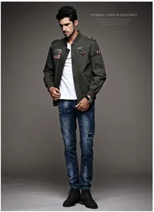 Professional full body shot of a men's olive green cotton bomber jacket with military patches