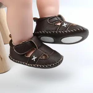 Dark brown leather baby sandals with soft non-slip soles for toddlers