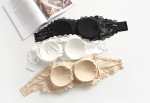 Detailed back view of lace tube top bras in black white and beige showing pads and buckles