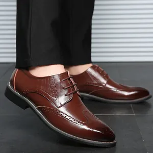 Classic brown leather Brogue dress shoes for men with elegant wingtip detailing