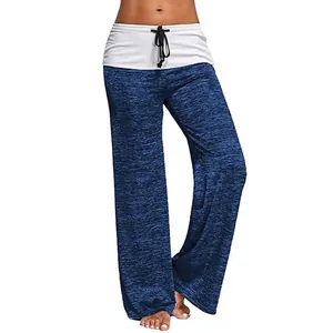 Detailed view of blue melange wide-leg yoga pants with white drawstring waistband
