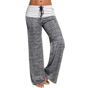Close-up detail of women's heather grey wide-leg yoga pants with white waistband