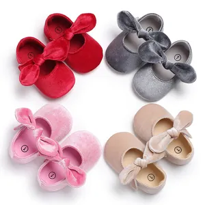 Detail view of soft-sole velvet baby princess walking shoes with cute bowknot in four colors