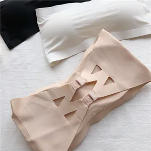 Detailed view of the back closure and laser-cut patterns of a seamless bandeau bra.