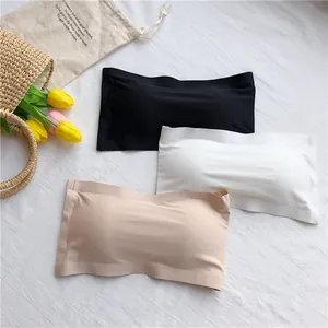 Detail view of seamless ice silk strapless bandeau bras in black, white, and beige