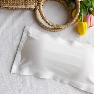 Close-up detail of a white ice silk seamless strapless tube top featuring soft wavy edges