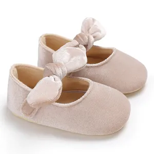 Elegant soft sole velvet baby princess shoes with a large decorative bow for toddlers