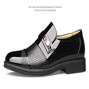 Side view of black glossy men's dress shoe with perforated details and metallic buckle