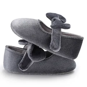 Soft velvet baby princess shoes with bow detail and flexible sole for toddlers