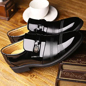 Premium black patent leather men's dress shoes with polished finish for business