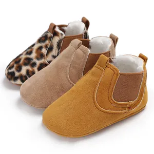Selection of cozy infant winter boots featuring faux fur lining and soft suede exterior