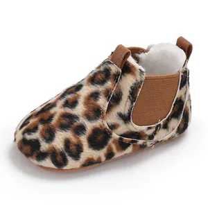 Close-up of baby leopard print faux fur bootie with warm white fuzzy lining detail