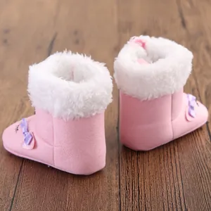 Detailed view of pink baby girl winter snow boots with soft faux fur lining