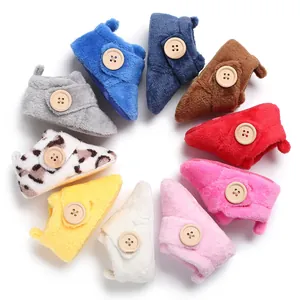 Variety of colorful plush baby shoes with soft soles for winter infant walking