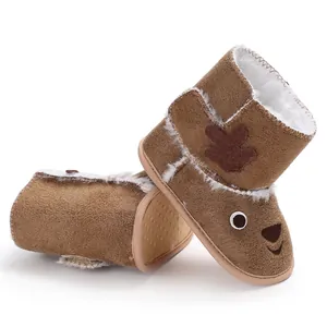 Cute brown reindeer-themed baby winter boots featuring soft soles and warm faux fur lining