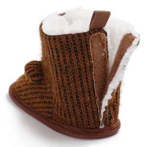 Close-up of baby winter snow boots with soft fleece lining and hook-and-loop fastener