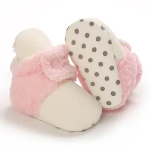 Botas de nieve rosas de felpa para bebé con suela antideslizante de lunares