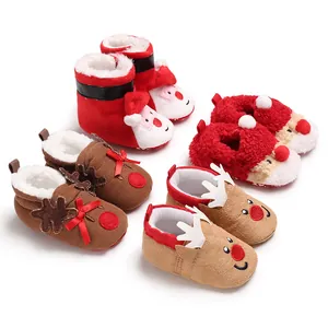 Detailed view of Christmas themed baby winter cotton shoes featuring Santa and reindeer designs