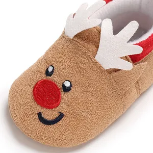 Detailed close-up view of reindeer baby walker shoes for winter with cute white antlers
