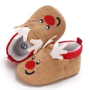 Close-up of adorable reindeer-themed baby winter walker shoes with soft brown fabric