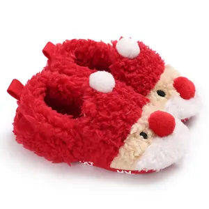 Soft fuzzy Santa Claus themed baby winter slippers with cute plush details and cozy lining