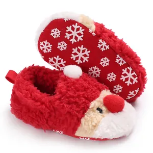 Close-up of Santa Claus themed plush baby walking shoes with snowflake patterned sole