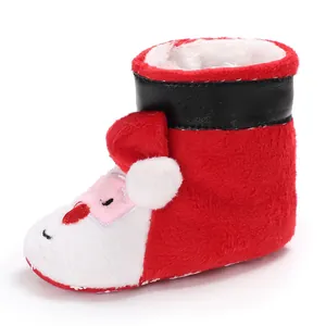 Detailed side view of plush Christmas Santa Claus baby winter warm walking boots