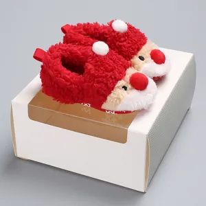 Santa Claus themed infant winter slippers with soft fuzzy texture and warm lining for babies