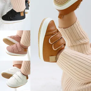 Detailed view of baby faux leather pre-walker shoes with adjustable straps in multiple colors