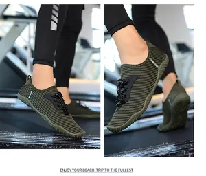 Detail of breathable green quick-dry water shoes with adjustable laces on a treadmill
