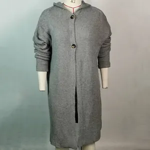 Detailed view showing the texture and hood of a long grey hooded knit cardigan sweater