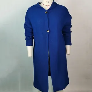 Elegant long royal blue knitted cardigan sweater coat for women displayed on mannequin
