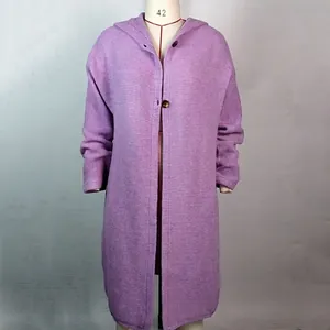 Detailed view of a long purple hooded knit cardigan sweater with ribbed texture for women